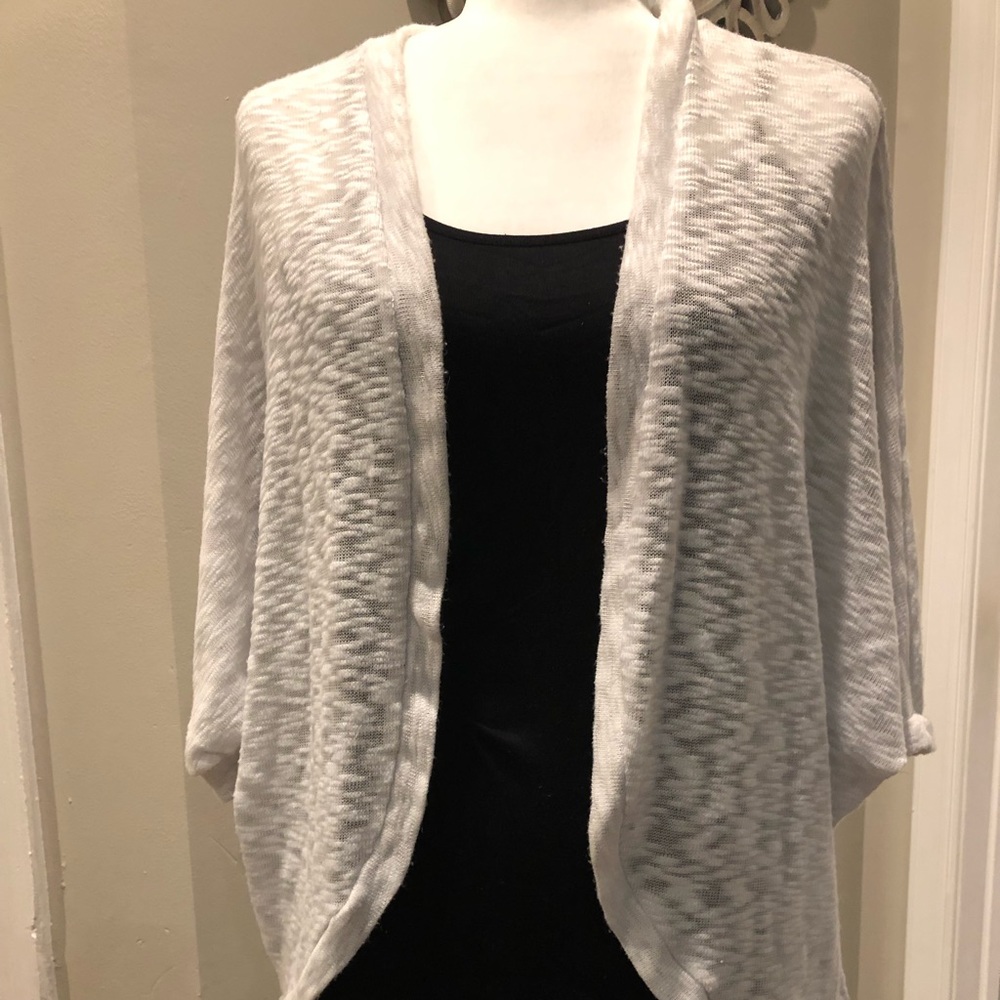 Open front sweater with lace detail in the back